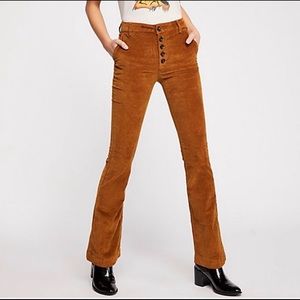 Free People flare pants, velvet. In Dark Mustard